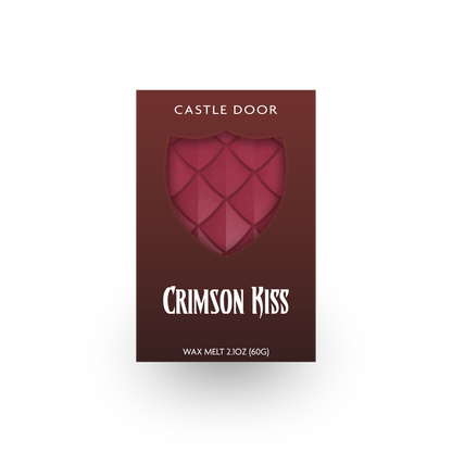 Crimson Kiss wax melt in burgundy packaging with deep red dragonscale shield window