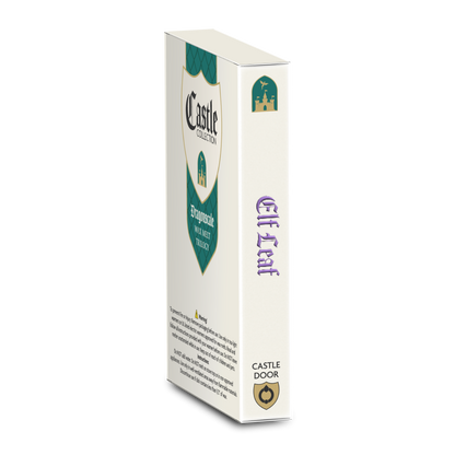 Side view of Castle Door's Elf Leaf wax melt box, showing the book-style spine, purple lettering, and Castle Door branding.