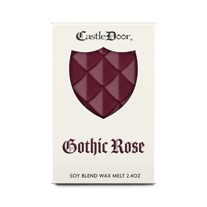 Front view of Castle Door Gothic Rose wax melt packaging, featuring burgundy dragonscale wax and burgundy fantasy-inspired lettering.