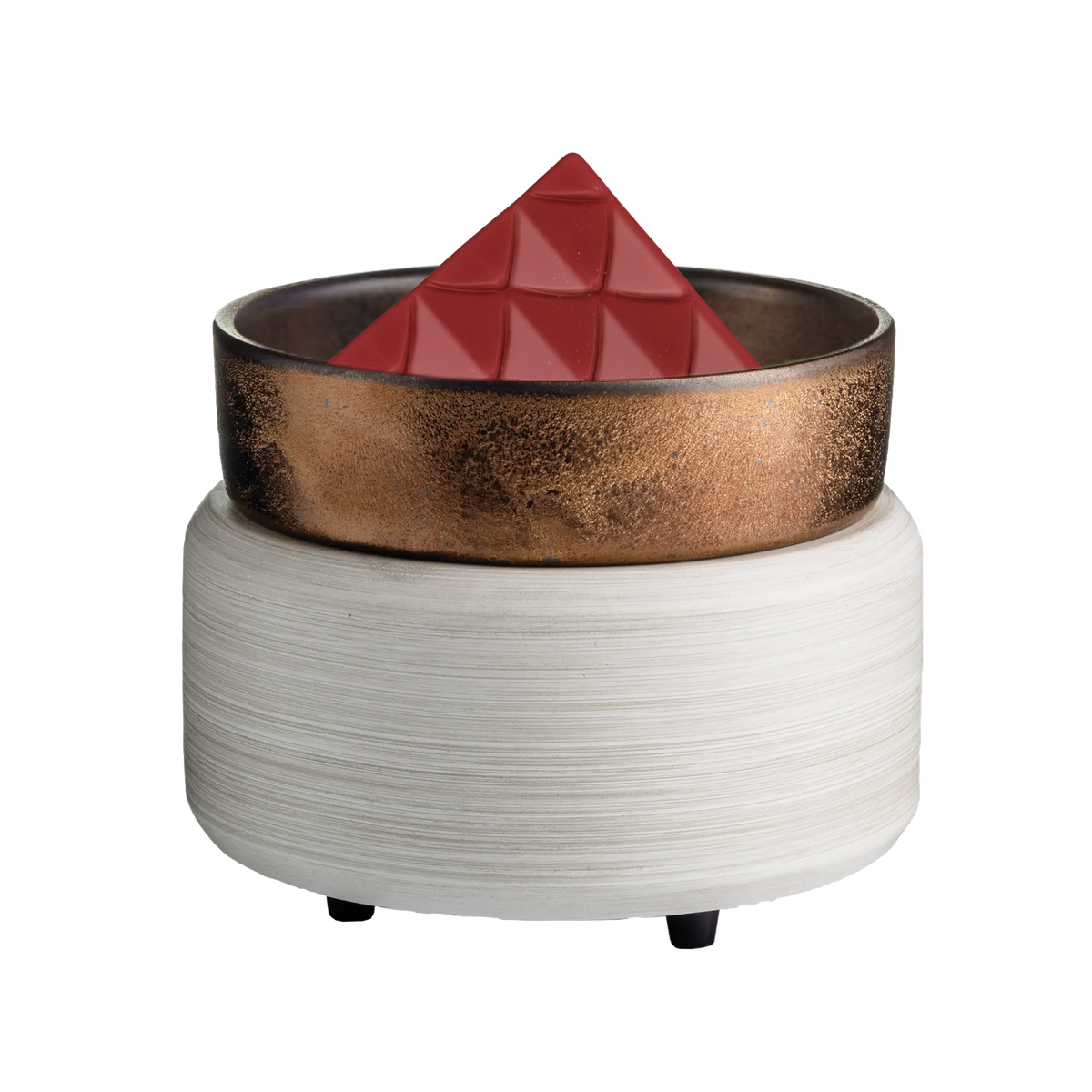 White electric wax melt warmer with a bronze dish holding a red dragonscale wax melt from Castle Door.