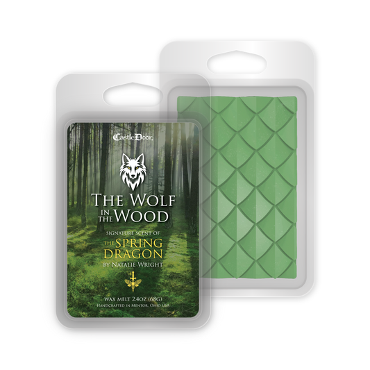 The Wolf in the Wood dragonscale wax melt with green snap bar and forest-themed label inspired by The Spring Dragon by Natalie Wright