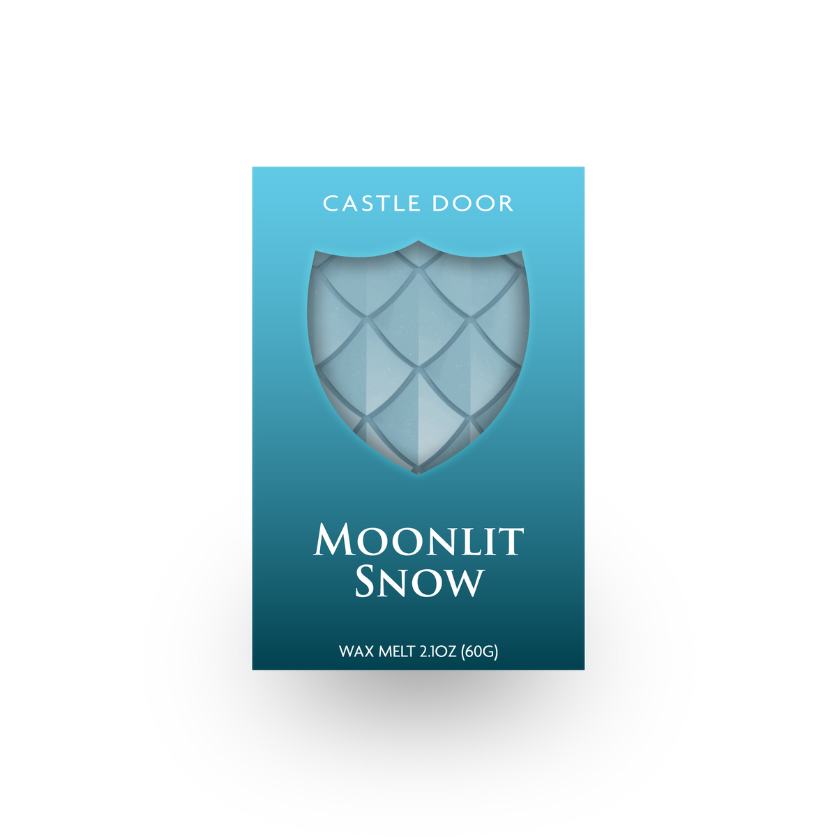 Front packaging of Castle Door Moonlit Snow wax melt, featuring icy blue dragonscale wax visible through a shield-shaped window.