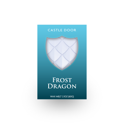 Front packaging of Castle Door Frost Dragon wax melt, featuring white dragonscale wax visible through a shield-shaped window.