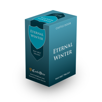 Three-quarter view of Castle Door's Eternal Winter Wax Melt Trilogy gift box, showing its teal packaging and shield emblem.